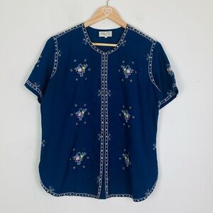 Vintage navy blue cottagecore button front top with embroidery and trim.